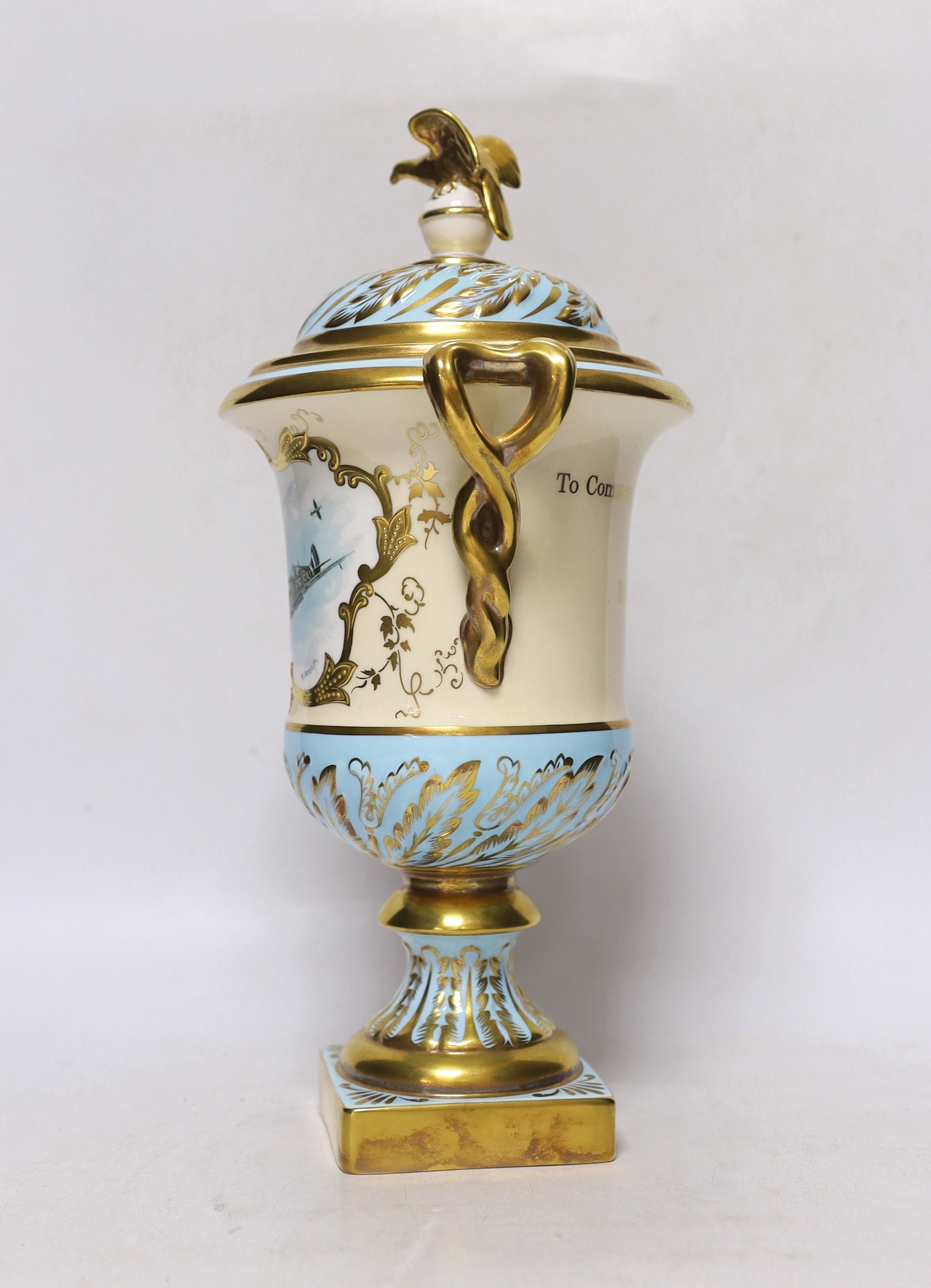 A Coalport boxed presentation urn and cover, signed M Harnett, limited edition of 50, no 40, 32cm high